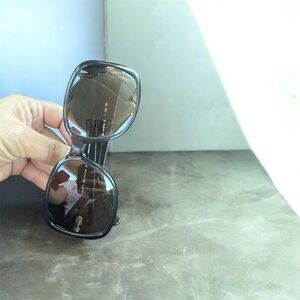 Tory Burch Glossy Black Oval Sunglasses